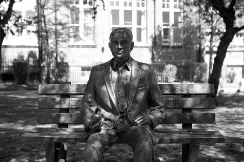 Black and white photo of a statue of Alan Turing