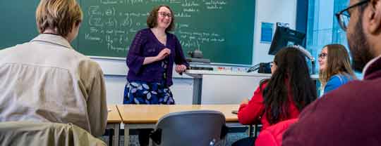 Lecturer presenting in a classroom