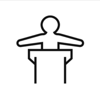 A black outline icon of a person stood at a lecture podium, their arms outstretched either side of them
